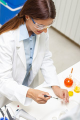 Beautiful long hair girl in laboratory