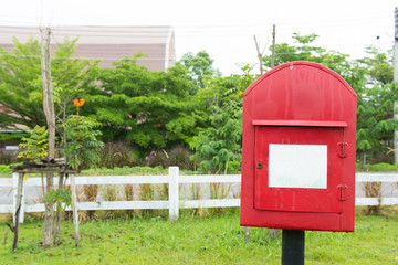 Red post box.
