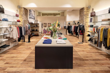 Interior of a modern concept store, displaying fashion
