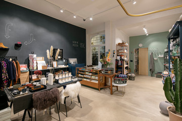 Interior of a modern concept store, displaying fashion