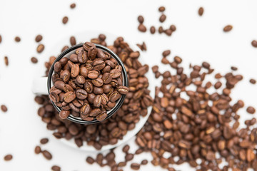 Top View of Coffee beans in a White Coffee cups on White Background