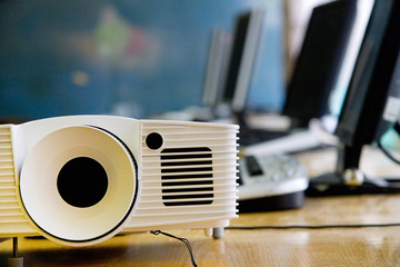 LCD video projector at business conference or lecture in office with copy space