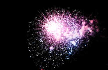 Colorful fireworks in the sky on black background