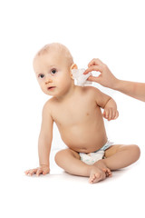Mother Wiping Baby's Face isolated on a white background. concept cleaning wipe, pure, clean