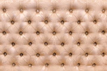 sofa back upholstered in fabric as background and texture