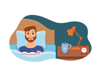 Guy lying on bed in home bedroom and reading a book in her hands