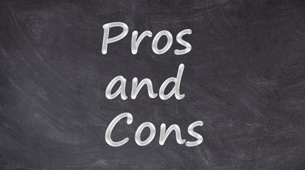 Pros and Cons written on blackboard