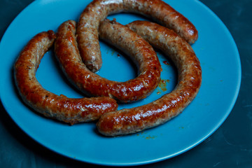 Fototapeta premium grilled beef sausages with a golden crust