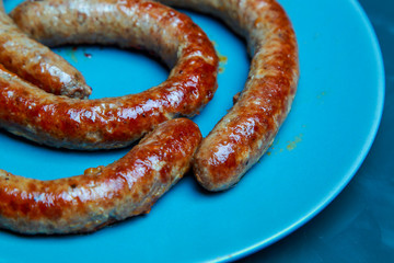 grilled beef sausages with a golden crust