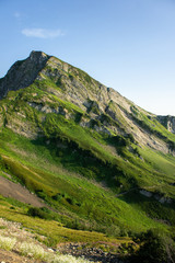 Top view of the mountain range and peaks. Mountain peak in the summer.