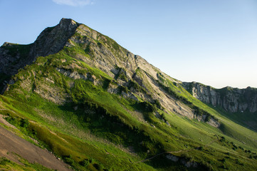 Top view of the mountain range and peaks. Mountain peak in the summer.