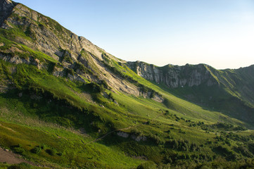 Top view of the mountain range and peaks. Mountain peak in the summer.