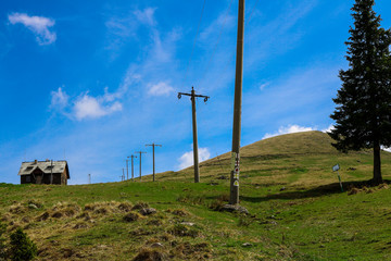 Fototapeta na wymiar Telegraph road near Rarau Peak in Bucovina, Romania.