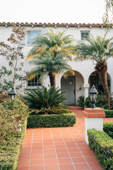 Fototapeta na wymiar A house with gardens and palm trees in Dana Point, Orange County, California