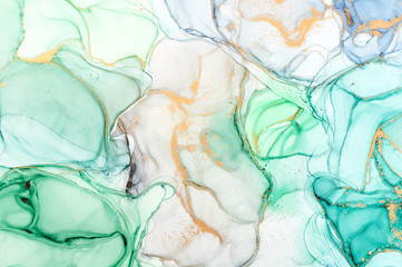 Fluid Art . Abstract colorful background, wallpaper. Mixing paints. Modern art. Marble texture. Alcohol ink colors  translucent