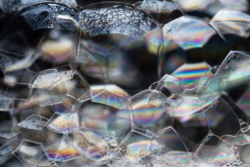 Obraz premium Close-up soap bubbles on black. Abstract background