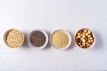 Superfoods in Bowls on white Background.