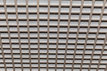 ceiling steel grate. Design of the ceiling in the shopping center.