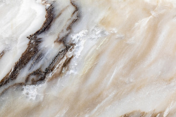 Closeup surface of marble pattern at the marble floor texture background , yellow abstract marble pattern