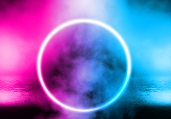 Background of empty stage, room. Reflection on wet pavement, concrete. Neon blurry lights. Neon circle figure in the center, smoke