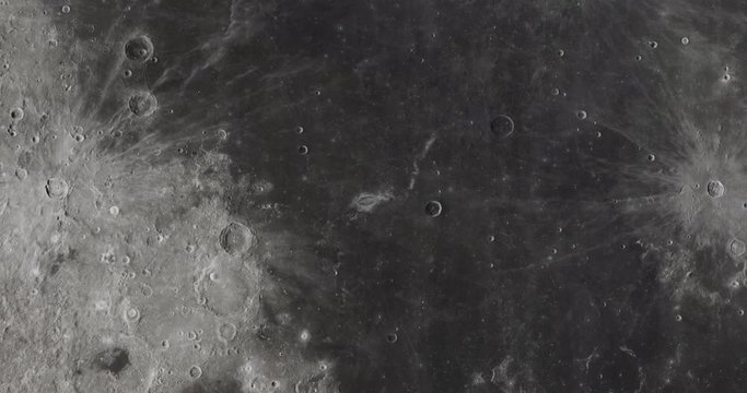 Orbital flyover of lunar equator at -60 degrees longitude. Clip loops and is reversible. Elements of this image furnished by NASA
