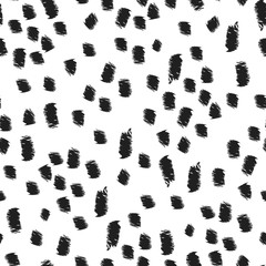 Seamless repeat pattern with an abstract texture made of pencil marks or brush strokes, black spots or dots