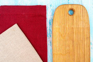 Wooden oak cutting board. Kitchenware. Copy space.