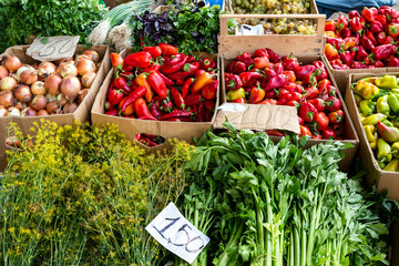 Farmers food market with fresh, varied, seasonal, organic vegetables and fruits. Bio food for healthy life. Farm vegetables and greenery in the box.