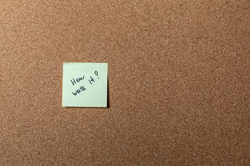 green sticker on brown table. color sticker, motivational, quote and words, note, message