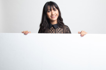 Fototapeta premium Young Asian woman with blank sign.