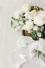 Obraz na płótnie Canvas Beautiful luxury bouquet of mixed flowers. Wedding details. Wedding rings