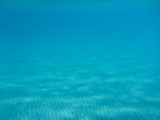 Underwater view of the beautiful Skala beach of Kefalonia island, Ionian sea, Greece.