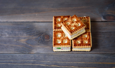 Cookies with marshmallows and marmalade on a wooden table. Fresh homemade pastries.