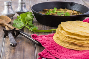 Mexican cuisine. Pork in green sauce.