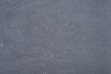 Dark grey slate background or texture. Copy space for text or design.