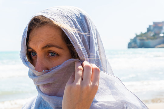 young women with light gray scarf