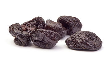 Fresh dry prunes, Dried sweet plums, close-up, isolated on white background
