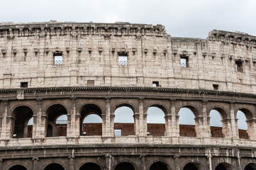 Naklejka premium Colosseo amphitheater in cloud day.
