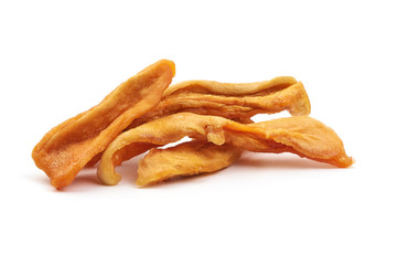 Tasty dried papaya strips, sweet fruit slices, close-up, isolated on white background