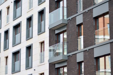 Fragment of a modern apartment building in front. Very modern apartment house.