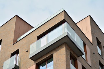 Fragment of a modern apartment building in front. Very modern apartment house.