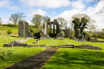 Obraz premium Inch Abbey, Northern Ireland, a large ruined monastic site close to Downpatrick, County Down on the north bank of the River Quoile