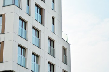 Fragment of a modern apartment building in front. Very modern apartment house.