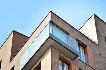 Fragment of a modern apartment building in front. Very modern apartment house.