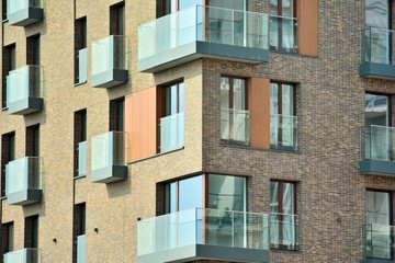 Fragment of a modern apartment building in front. Very modern apartment house.