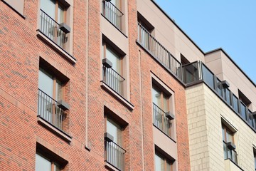 Fragment of a modern apartment building in front. Very modern apartment house.