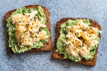 Toast with mashed avocado and scramble egg
