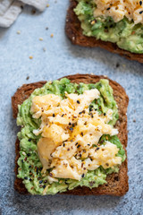 Toast with mashed avocado and scramble egg
