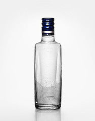 bottle, vodka, glass, isolated, water, liquor, white, gin, clear, background, empty, cold, transparent, cool, ice, russian, blue, shape, simplicity, drink, cocktail, wet, alcohol, alcoholic, jubilee
