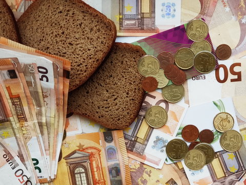 Money and bread save  money in bank euro cash and coins